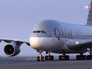 Самолет авиакомпании Катар Самолет авиакомпании Катар