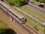 Поезд метро на открытом участке Поезд метро на открытом участке