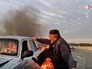 Мужчина спасает участников ДТП из горящего автомобиля Мужчина спасает участников ДТП из горящего автомобиля