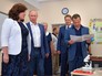 Владимир Путин и Дмитрий Медведев во время посещения новой школы в Севастополе Владимир Путин и Дмитрий Медведев во время посещения новой школы в Севастополе