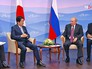 Президент России Владимир Путин и премьер-министр Японии Синдзо Абэ Президент России Владимир Путин и премьер-министр Японии Синдзо Абэ