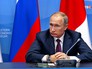 Президент России Владимир Путин на встрече с премьер-министр Японии Президент России Владимир Путин на встрече с премьер-министр Японии
