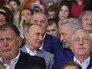 Владимир Путин во время посещения образовательного центра "Сириус" наблюдает за хоккейным матчем в рамках открытого первенства Московской области по хоккею с шайбой среди юношей Владимир Путин во время посещения образовательного центра "Сириус" наблюдает за хоккейным матчем в рамках открытого первенства Московской области по хоккею с шайбой среди юношей