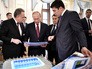 Владимир Путин во время осмотра выставки, посвящённой подготовке стадионов и аэропортов городов-хозяев к проведению чемпионата мира по футболу FIFA 2018 года Владимир Путин во время осмотра выставки, посвящённой подготовке стадионов и аэропортов городов-хозяев к проведению чемпионата мира по футболу FIFA 2018 года