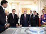 Владимир Путин во время осмотра выставки, посвящённой подготовке стадионов и аэропортов городов-хозяев к проведению чемпионата мира по футболу FIFA 2018 года Владимир Путин во время осмотра выставки, посвящённой подготовке стадионов и аэропортов городов-хозяев к проведению чемпионата мира по футболу FIFA 2018 года