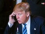 Президент США Дональд Трамп разговаривает по телефону Президент США Дональд Трамп разговаривает по телефону