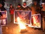 Митингующие палестинцы жгут портреты Дональда Трампа Митингующие палестинцы жгут портреты Дональда Трампа