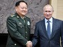 Президент России Владимир Путин и зампредседателя Центрального военного совета Коммунистической партии Китая Чжан Юся Президент России Владимир Путин и зампредседателя Центрального военного совета Коммунистической партии Китая Чжан Юся