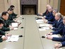 Президент России Владимир Путин и зампредседателя Центрального военного совета Коммунистической партии Китая Чжан Юся Президент России Владимир Путин и зампредседателя Центрального военного совета Коммунистической партии Китая Чжан Юся