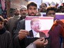 Митингующие палестинцы жгут портреты Дональда Трампа Митингующие палестинцы жгут портреты Дональда Трампа