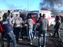 Скорая помощь в Палестине увозит пострадавшего в уличных беспорядках Скорая помощь в Палестине увозит пострадавшего в уличных беспорядках