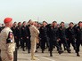 Военнослужащие во время военного парада на на российской авиабазе "Хмеймим" Военнослужащие во время военного парада на на российской авиабазе "Хмеймим"