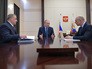 Президент России Владимир Путин, министр финансов Антон Силуанов и глава МЧС Владимир Пучков во время встречи Президент России Владимир Путин, министр финансов Антон Силуанов и глава МЧС Владимир Пучков во время встречи