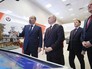 Владимир Путин во время осмотра выставки в рамках форума малых городов и исторических поселений Владимир Путин во время осмотра выставки в рамках форума малых городов и исторических поселений