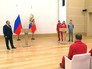 Президент России Владимир Путин и члены олимпийской сборной Президент России Владимир Путин и члены олимпийской сборной