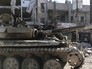 Бронетехника сирийской армии в освобожденном населенном пункте Кафр-Батна в Восточной Гуте Бронетехника сирийской армии в освобожденном населенном пункте Кафр-Батна в Восточной Гуте