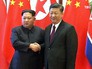 Ким Чен Ын и Си Цзиньпин Ким Чен Ын и Си Цзиньпин