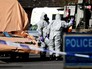 Полиция Великобритании в костюмах химзащиты Полиция Великобритании в костюмах химзащиты