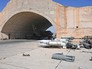 Последствия ракетного удара по авиабазе в Сирии Последствия ракетного удара по авиабазе в Сирии