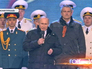 Владимир Путин на митинг-концерте "Мы вместе!" Владимир Путин на митинг-концерте "Мы вместе!"