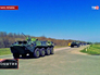 Колонна бронетехники на дороге в пригороде Луганска Колонна бронетехники на дороге в пригороде Луганска