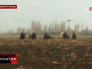 Военнослужащие Украины штурмуют аэродром в Краматорска Военнослужащие Украины штурмуют аэродром в Краматорска
