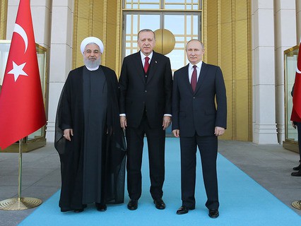 Президент Ирана Хасан Рухани, президент Турции Реджеп Тайип Эрдоган и президент России Владимир Путин