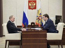 Владимир Путин и министр экономического развития РФ Максим Орешкин