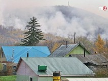 Лесные пожары подступают к домам