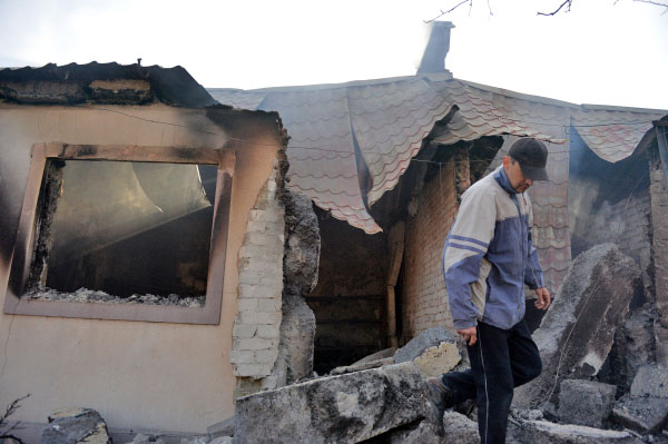 Последствия обстрела жилых кварталов в Донецкой области