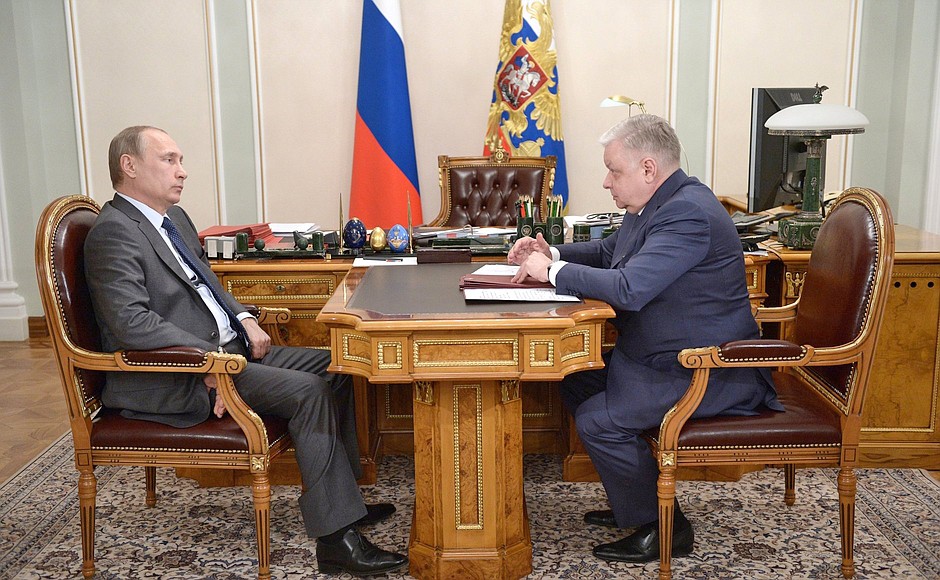 Президент России Владимир Путин и директор ФМС Константин Ромодановский