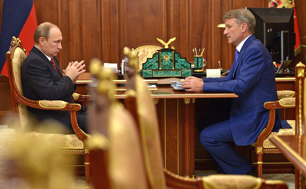 Президент России Владимир Путин и председатель правления Сбербанка России Герман Греф