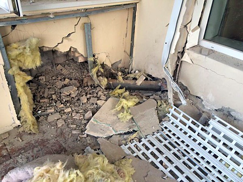 Последствия обстрела жилых кварталов Донбасса