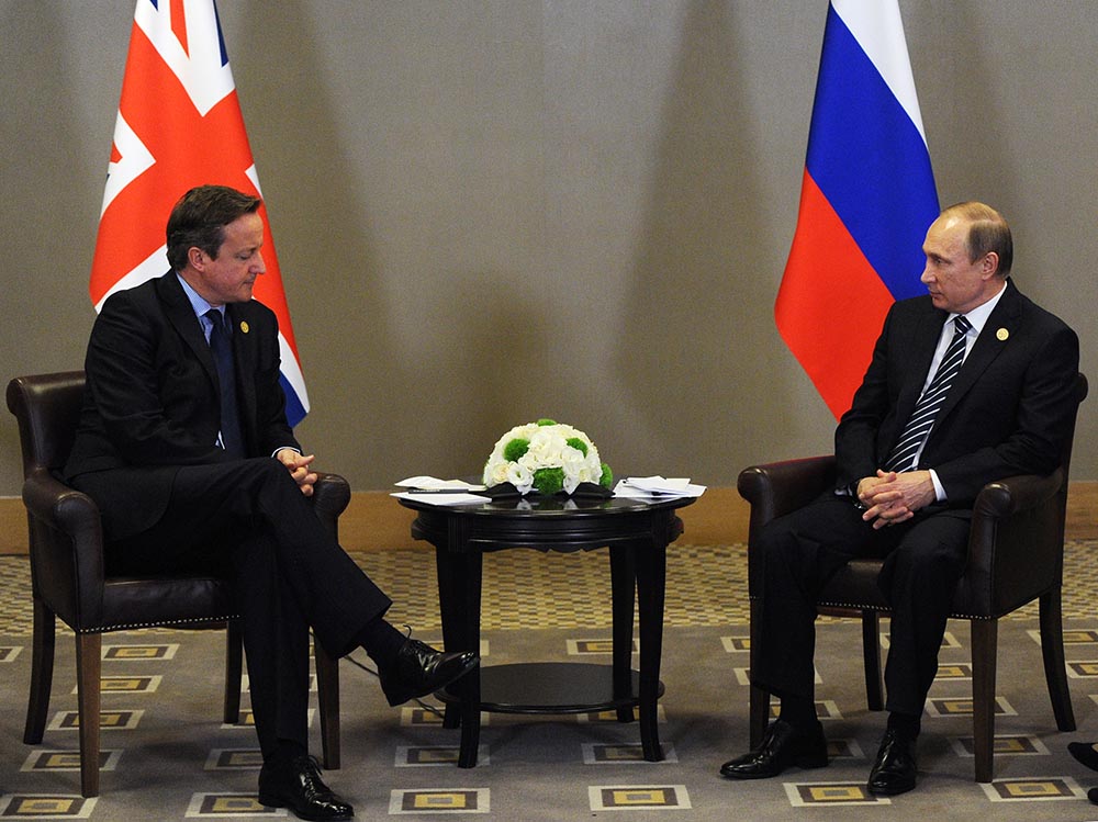 Президент России Владимир Путин и премьер-министр Великобритании Дэвид Кэмерон