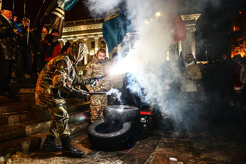 Участники акции, посвященной годовщине начала событий на Майдане