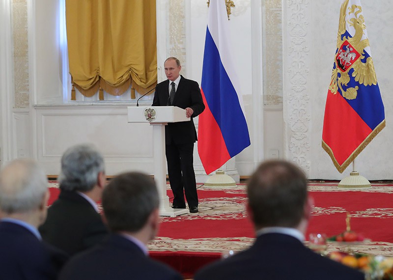 Президент РФ Владимир Путин выступает во время ежегодного торжественного приёма в Кремле по случаю празднования Дня Героев Отечества