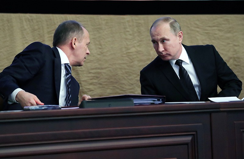 Президент России Владимир Путин и директор ФСБ Александр Бортников на заседании коллегии ФСБ