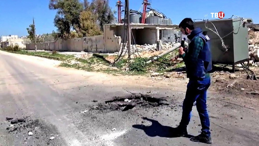 Посановочная съемка на месте применения химического оружия в Сирии