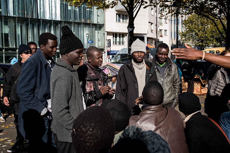 Мигранты в Париже 