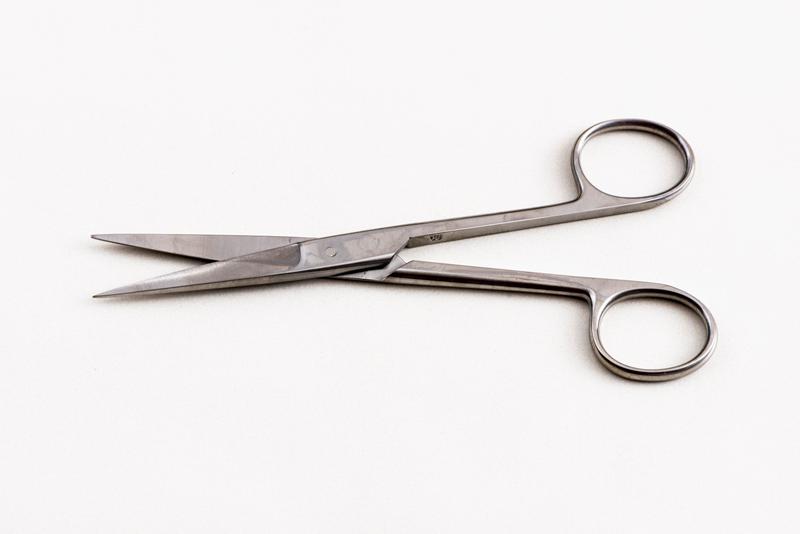 A pair of scissors. A pair of scissors