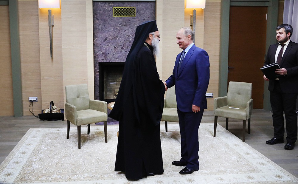 Президент России Владимир Путин и патриарх Антиохийский и всего Востока Иоанн