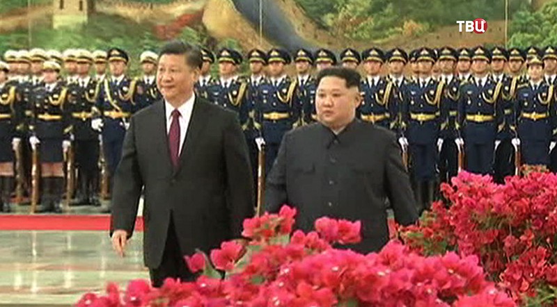 Ким Чен Ын в Китае с Си Цзиньпином