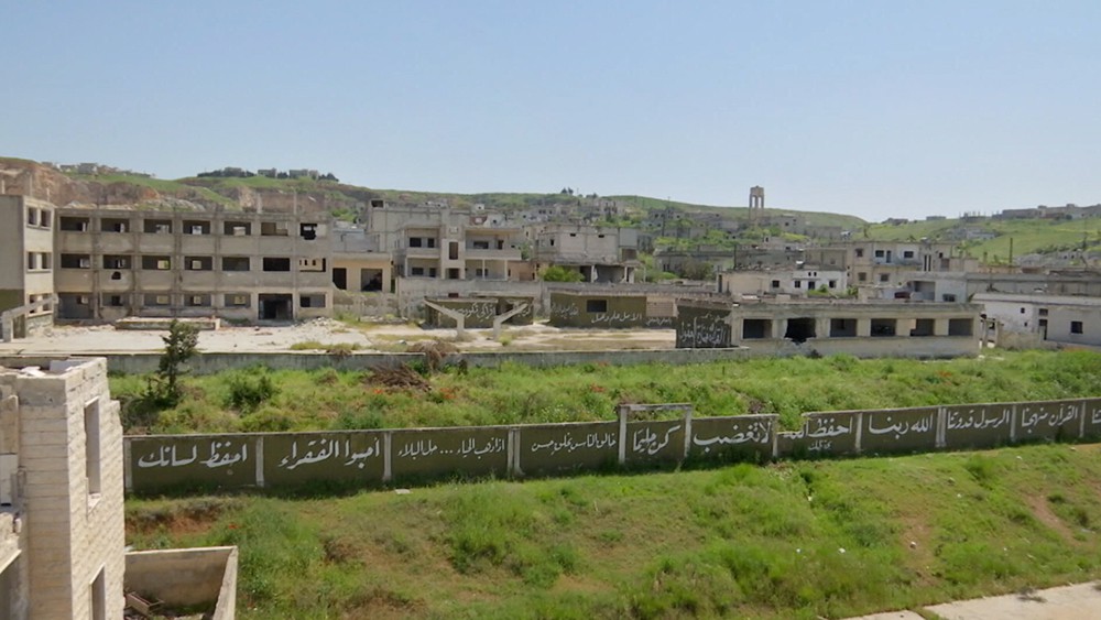 Полуразрушенная боевиками школа в Сирии