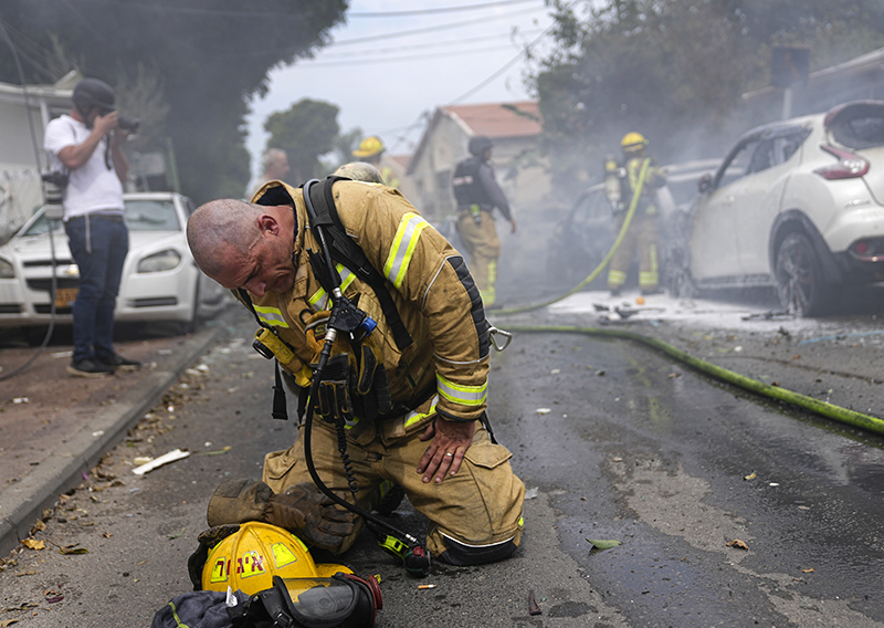 Kneel Fire. Israel Monday Company.